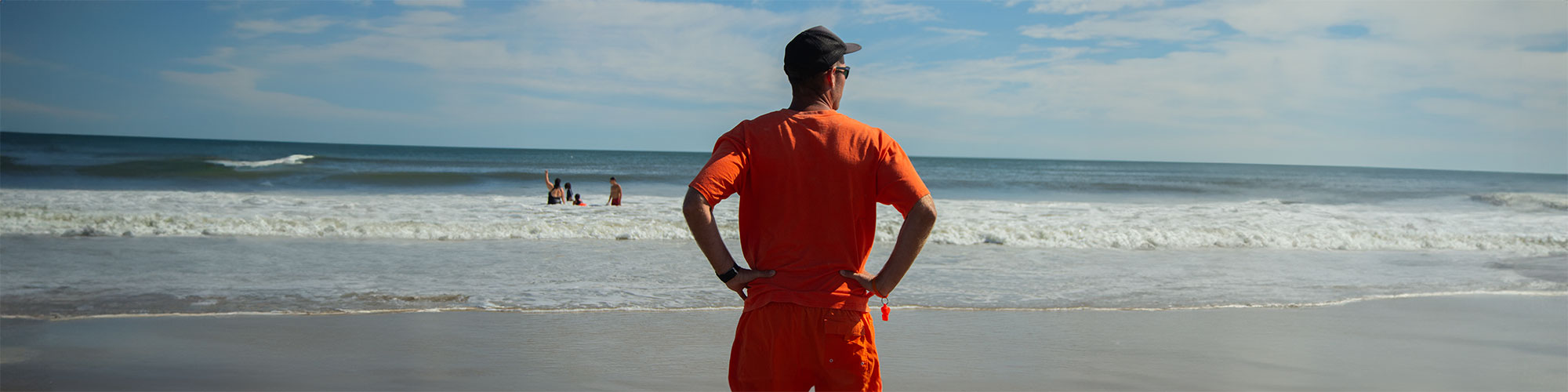 Lifeguard looks over a beach.